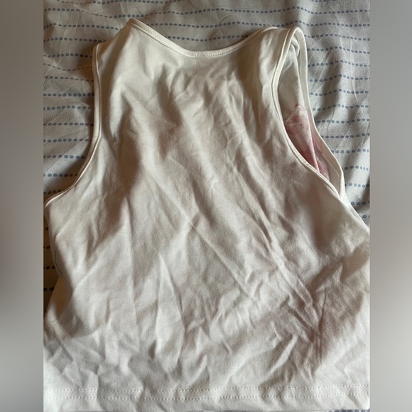 Unbranded white graphic tank top with red graphics, sized Medium. - Picture 2 of 2